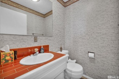 Love where you live in this beautifully maintained end-unit on LakeRidge Golf Course in Nevada - for sale on GolfHomes.com, golf home, golf lot