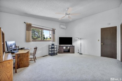 Love where you live in this beautifully maintained end-unit on LakeRidge Golf Course in Nevada - for sale on GolfHomes.com, golf home, golf lot