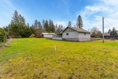 Opportunity knocks! This 3-bedroom, 2-bath home sits on a on Grants Pass Golf Club in Oregon - for sale on GolfHomes.com, golf home, golf lot