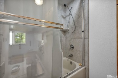 Love where you live in this beautifully maintained end-unit on LakeRidge Golf Course in Nevada - for sale on GolfHomes.com, golf home, golf lot
