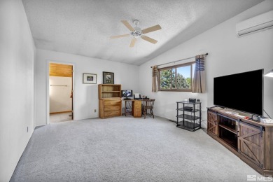Love where you live in this beautifully maintained end-unit on LakeRidge Golf Course in Nevada - for sale on GolfHomes.com, golf home, golf lot