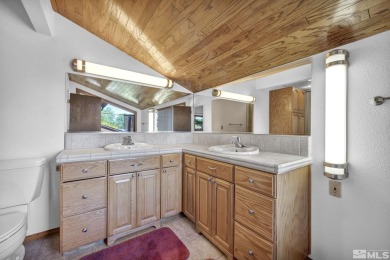 Love where you live in this beautifully maintained end-unit on LakeRidge Golf Course in Nevada - for sale on GolfHomes.com, golf home, golf lot