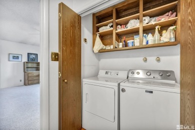 Love where you live in this beautifully maintained end-unit on LakeRidge Golf Course in Nevada - for sale on GolfHomes.com, golf home, golf lot