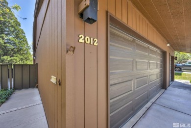 Love where you live in this beautifully maintained end-unit on LakeRidge Golf Course in Nevada - for sale on GolfHomes.com, golf home, golf lot