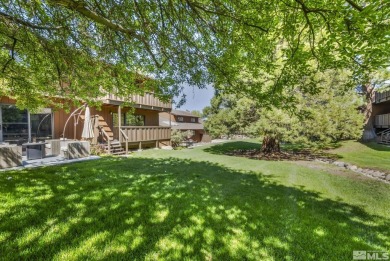 Love where you live in this beautifully maintained end-unit on LakeRidge Golf Course in Nevada - for sale on GolfHomes.com, golf home, golf lot