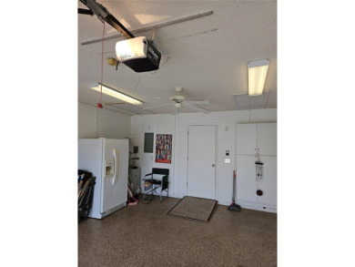 Near the beach!  Storm ready! 55+, turnkey Sarasota furnished on Village Green Golf Club of Sarasota in Florida - for sale on GolfHomes.com, golf home, golf lot