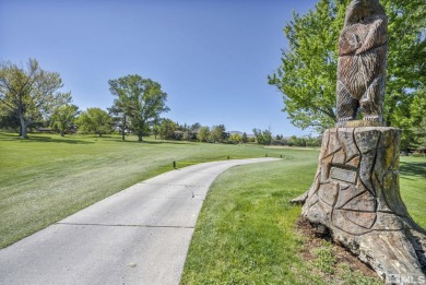 Love where you live in this beautifully maintained end-unit on LakeRidge Golf Course in Nevada - for sale on GolfHomes.com, golf home, golf lot