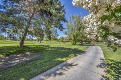 Love where you live in this beautifully maintained end-unit on LakeRidge Golf Course in Nevada - for sale on GolfHomes.com, golf home, golf lot