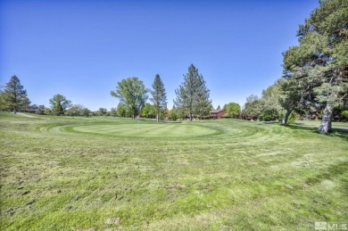 Love where you live in this beautifully maintained end-unit on LakeRidge Golf Course in Nevada - for sale on GolfHomes.com, golf home, golf lot