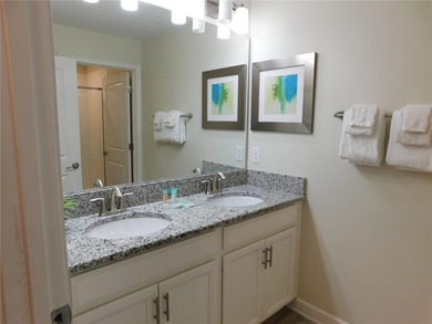 Welcome to this beautifully appointed 4-bedroom, 3-bath townhome on The Oasis Club at Champions Gate in Florida - for sale on GolfHomes.com, golf home, golf lot