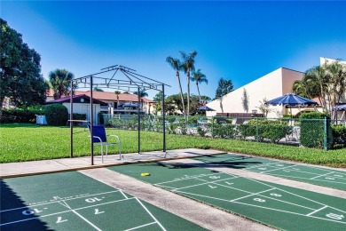 Near the beach!  Storm ready! 55+, turnkey Sarasota furnished on Village Green Golf Club of Sarasota in Florida - for sale on GolfHomes.com, golf home, golf lot