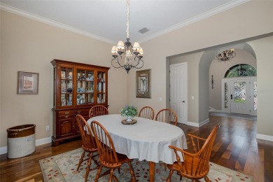 CHAMPIONS CLUB Luxury Bayfair Custom built home tucked behind on Fox Hollow Golf Club in Florida - for sale on GolfHomes.com, golf home, golf lot