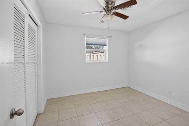 Located in the heart of Cooper City on a beautiful tree-lined on Cooper Colony Country Club in Florida - for sale on GolfHomes.com, golf home, golf lot