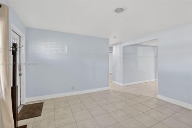 Located in the heart of Cooper City on a beautiful tree-lined on Cooper Colony Country Club in Florida - for sale on GolfHomes.com, golf home, golf lot