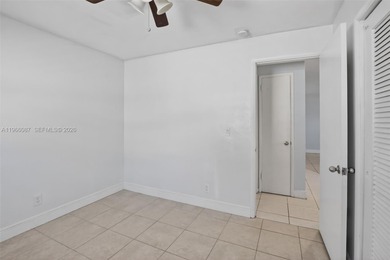 Located in the heart of Cooper City on a beautiful tree-lined on Cooper Colony Country Club in Florida - for sale on GolfHomes.com, golf home, golf lot