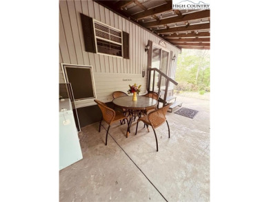 Don't miss this affordable cozy 1 bedroom, 1 bath park model on Land Harbor Golf Course in North Carolina - for sale on GolfHomes.com, golf home, golf lot