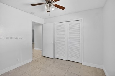Located in the heart of Cooper City on a beautiful tree-lined on Cooper Colony Country Club in Florida - for sale on GolfHomes.com, golf home, golf lot