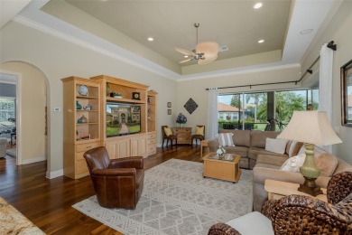 CHAMPIONS CLUB Luxury Bayfair Custom built home tucked behind on Fox Hollow Golf Club in Florida - for sale on GolfHomes.com, golf home, golf lot