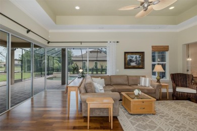CHAMPIONS CLUB Luxury Bayfair Custom built home tucked behind on Fox Hollow Golf Club in Florida - for sale on GolfHomes.com, golf home, golf lot