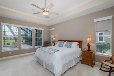 CHAMPIONS CLUB Luxury Bayfair Custom built home tucked behind on Fox Hollow Golf Club in Florida - for sale on GolfHomes.com, golf home, golf lot