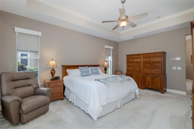 CHAMPIONS CLUB Luxury Bayfair Custom built home tucked behind on Fox Hollow Golf Club in Florida - for sale on GolfHomes.com, golf home, golf lot
