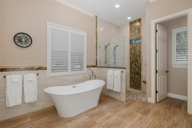 CHAMPIONS CLUB Luxury Bayfair Custom built home tucked behind on Fox Hollow Golf Club in Florida - for sale on GolfHomes.com, golf home, golf lot