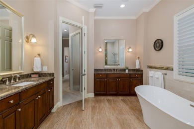 CHAMPIONS CLUB Luxury Bayfair Custom built home tucked behind on Fox Hollow Golf Club in Florida - for sale on GolfHomes.com, golf home, golf lot