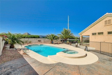 Hard-to-find gem! This 2 Bedroom + DEN, 2 Bath, 2 CAR on Highland Falls Golf Club in Nevada - for sale on GolfHomes.com, golf home, golf lot