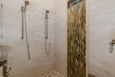 CHAMPIONS CLUB Luxury Bayfair Custom built home tucked behind on Fox Hollow Golf Club in Florida - for sale on GolfHomes.com, golf home, golf lot