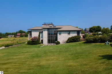 This superb home is an oasis of luxury and tranquility with on Lochen Heath Golf Course in Michigan - for sale on GolfHomes.com, golf home, golf lot