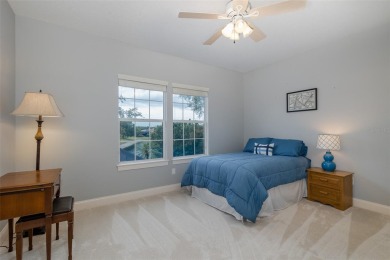 CHAMPIONS CLUB Luxury Bayfair Custom built home tucked behind on Fox Hollow Golf Club in Florida - for sale on GolfHomes.com, golf home, golf lot