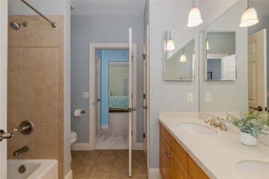 CHAMPIONS CLUB Luxury Bayfair Custom built home tucked behind on Fox Hollow Golf Club in Florida - for sale on GolfHomes.com, golf home, golf lot