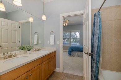CHAMPIONS CLUB Luxury Bayfair Custom built home tucked behind on Fox Hollow Golf Club in Florida - for sale on GolfHomes.com, golf home, golf lot