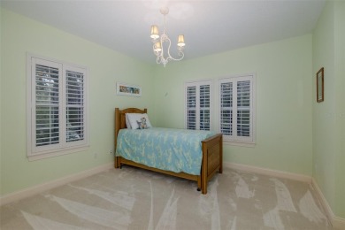 CHAMPIONS CLUB Luxury Bayfair Custom built home tucked behind on Fox Hollow Golf Club in Florida - for sale on GolfHomes.com, golf home, golf lot