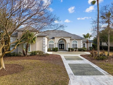 Live The Florida Lifestyle With Stunning Golf And Lake Views In on Marsh Creek Country Club in Florida - for sale on GolfHomes.com, golf home, golf lot