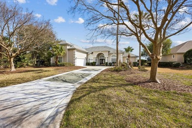 Live The Florida Lifestyle With Stunning Golf And Lake Views In on Marsh Creek Country Club in Florida - for sale on GolfHomes.com, golf home, golf lot