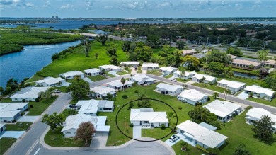 Welcome to your new home, located on a quiet cul-de-sac in River on River Isles Golf Club in Florida - for sale on GolfHomes.com, golf home, golf lot