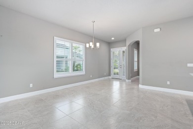 Enjoy Sunrise on your lanai with a fantastic water view! Classic on Plantation Bay Golf and Country Club in Florida - for sale on GolfHomes.com, golf home, golf lot