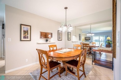 Spacious 2 bedroom, 2 bath condo well located in Deer Creek on Deer Creek Golf Club in Florida - for sale on GolfHomes.com, golf home, golf lot