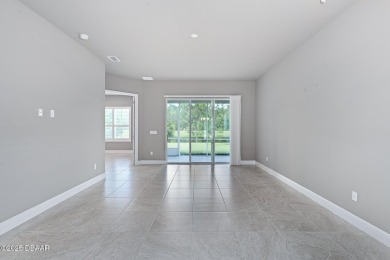 Enjoy Sunrise on your lanai with a fantastic water view! Classic on Plantation Bay Golf and Country Club in Florida - for sale on GolfHomes.com, golf home, golf lot
