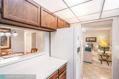 Spacious 2 bedroom, 2 bath condo well located in Deer Creek on Deer Creek Golf Club in Florida - for sale on GolfHomes.com, golf home, golf lot
