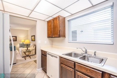 Spacious 2 bedroom, 2 bath condo well located in Deer Creek on Deer Creek Golf Club in Florida - for sale on GolfHomes.com, golf home, golf lot