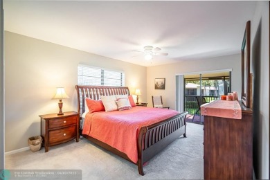 Spacious 2 bedroom, 2 bath condo well located in Deer Creek on Deer Creek Golf Club in Florida - for sale on GolfHomes.com, golf home, golf lot