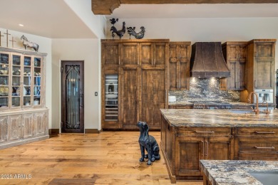 Nestled in a quiet cul-de-sac, this estate lies within the on Desert Highlands Golf Club in Arizona - for sale on GolfHomes.com, golf home, golf lot