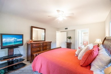 Spacious 2 bedroom, 2 bath condo well located in Deer Creek on Deer Creek Golf Club in Florida - for sale on GolfHomes.com, golf home, golf lot