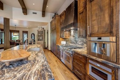 Nestled in a quiet cul-de-sac, this estate lies within the on Desert Highlands Golf Club in Arizona - for sale on GolfHomes.com, golf home, golf lot