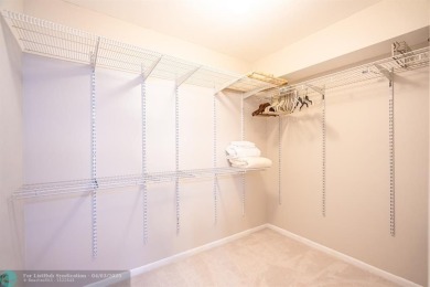 Spacious 2 bedroom, 2 bath condo well located in Deer Creek on Deer Creek Golf Club in Florida - for sale on GolfHomes.com, golf home, golf lot