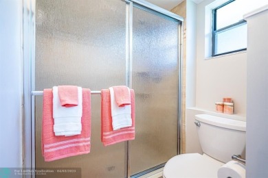 Spacious 2 bedroom, 2 bath condo well located in Deer Creek on Deer Creek Golf Club in Florida - for sale on GolfHomes.com, golf home, golf lot