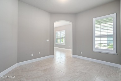 Enjoy Sunrise on your lanai with a fantastic water view! Classic on Plantation Bay Golf and Country Club in Florida - for sale on GolfHomes.com, golf home, golf lot