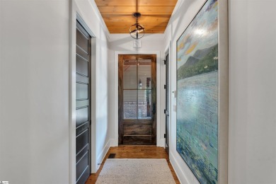 Located in the heart of The Village and surrounded by the beauty on The Reserve At Lake Keowee in South Carolina - for sale on GolfHomes.com, golf home, golf lot
